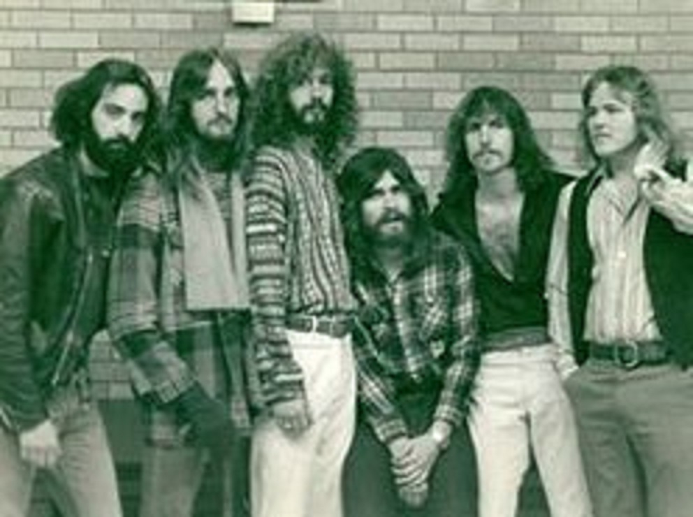 Group portrait of Hot Ice band members.